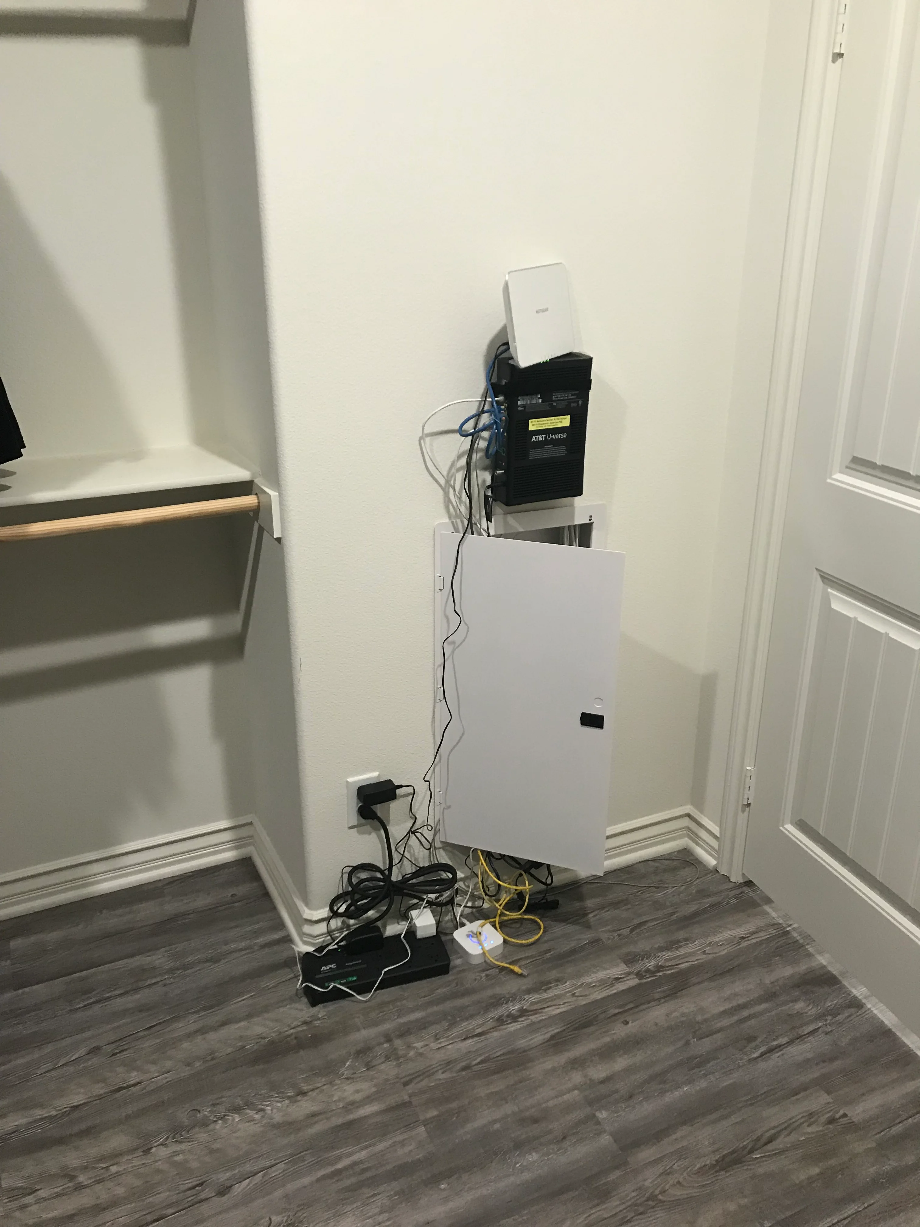 White network panel with AT&T gateway and organized low-voltage wiring installation